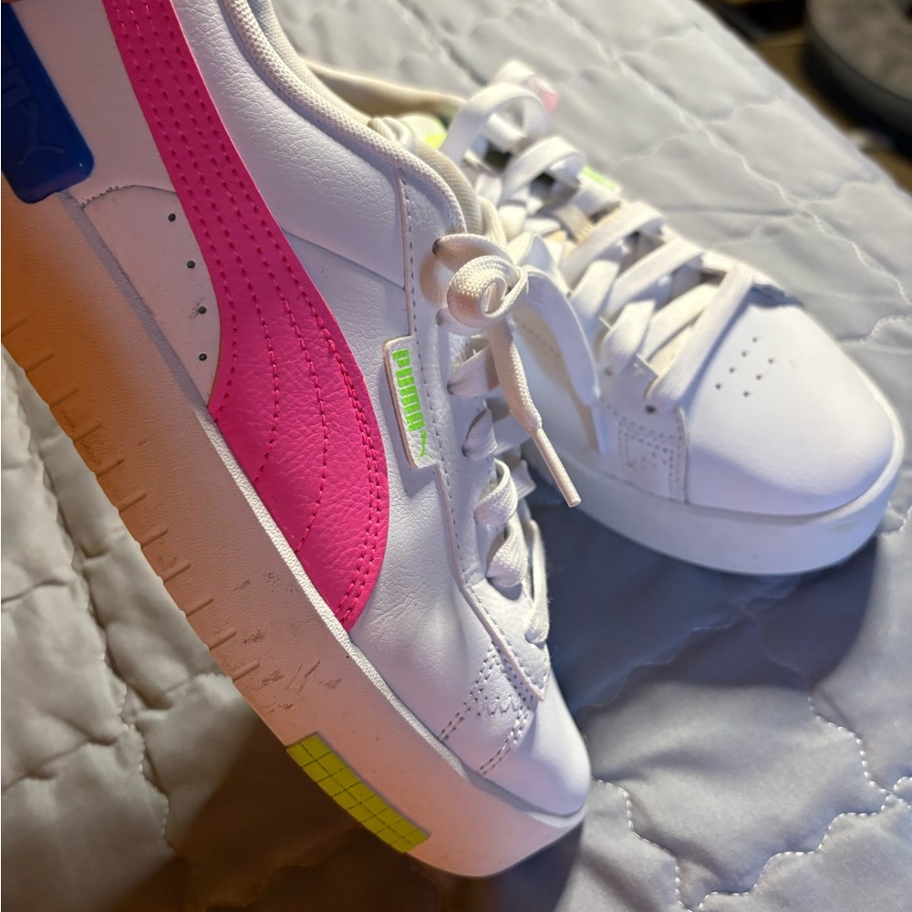 Puma White and Pink Athletic Shoes with Vibrant Accents